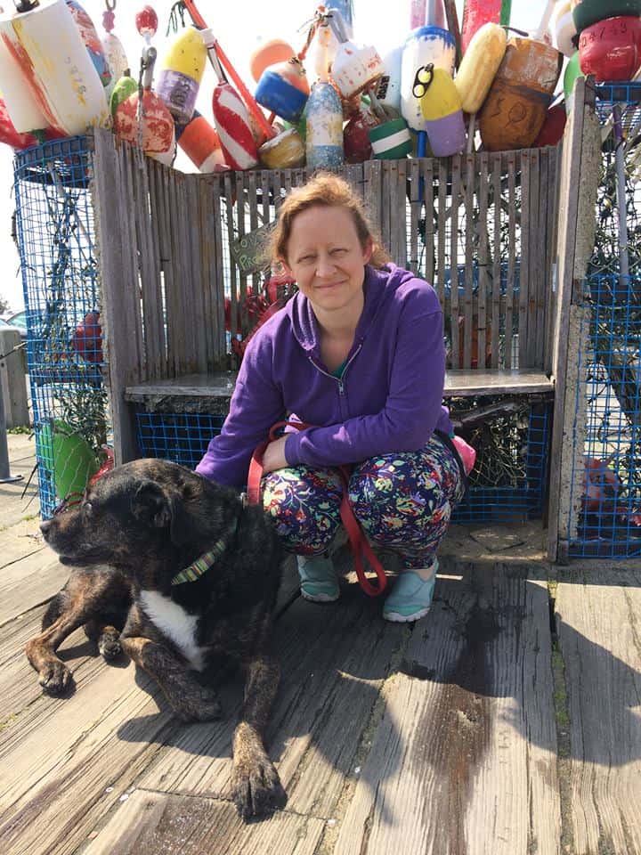 Woman and dog on Cape Cod, MA