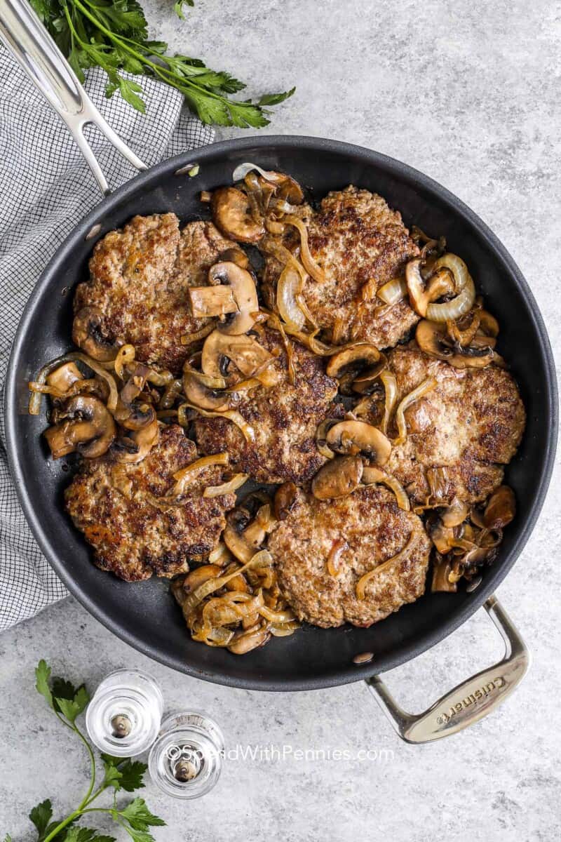 Browned salisbury steak patties with mushrooms and onions