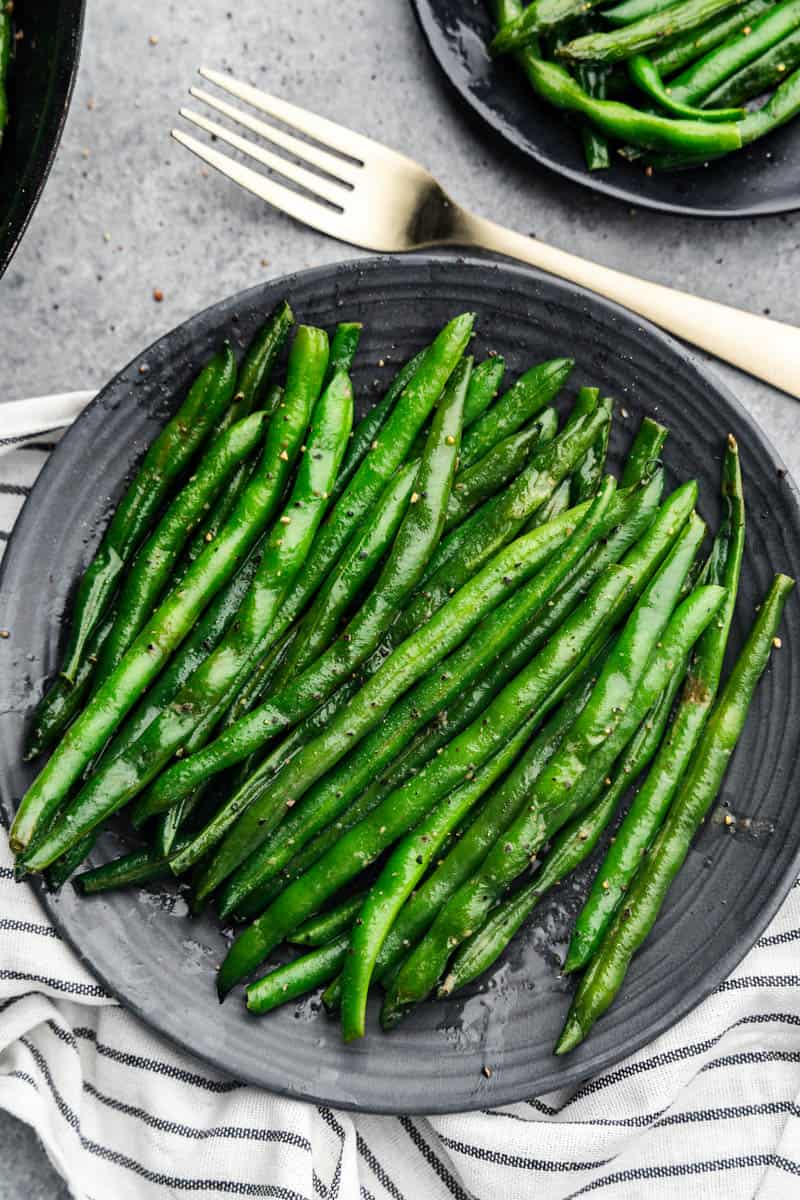 best green beans ever on black plate