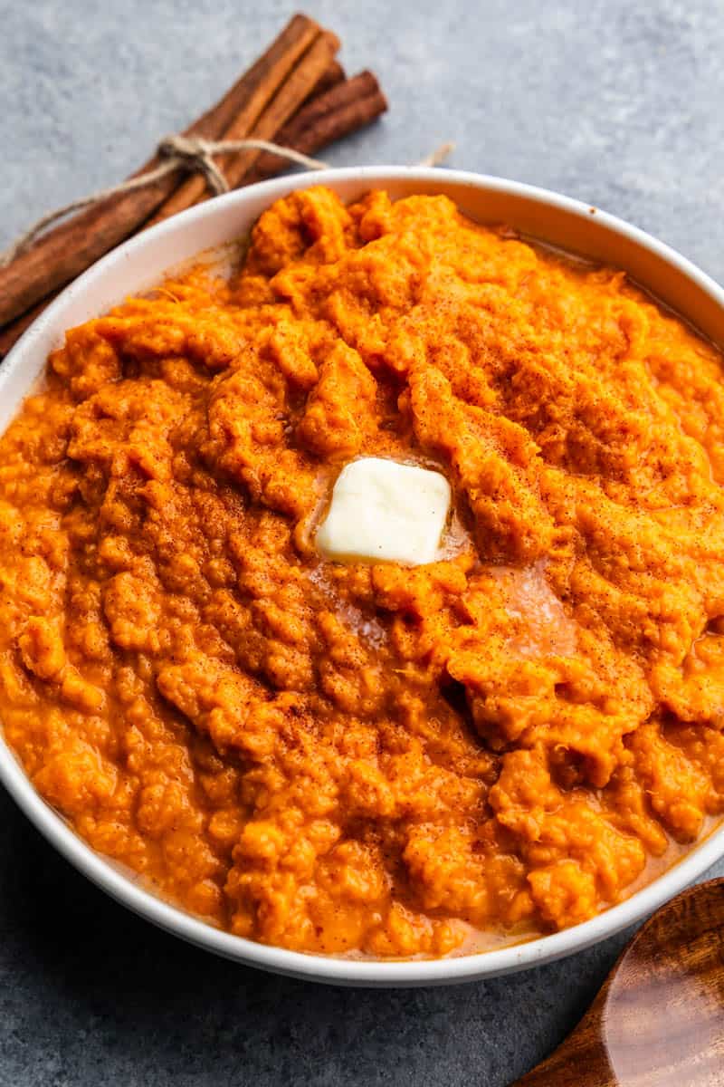 large white bowl of mashed sweet potatoes