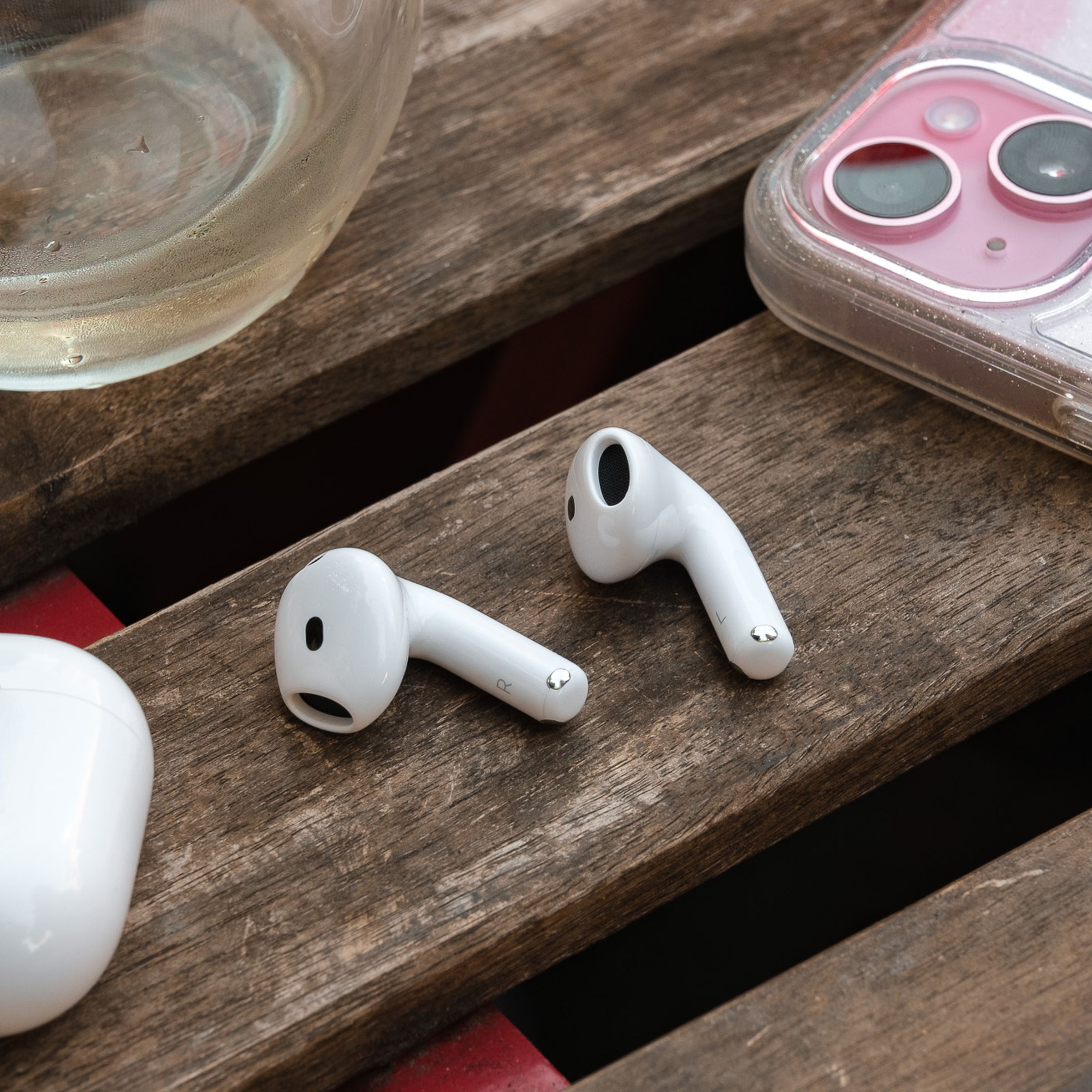 A hands-on photo of Apple’s AirPods 4 wireless earbuds.