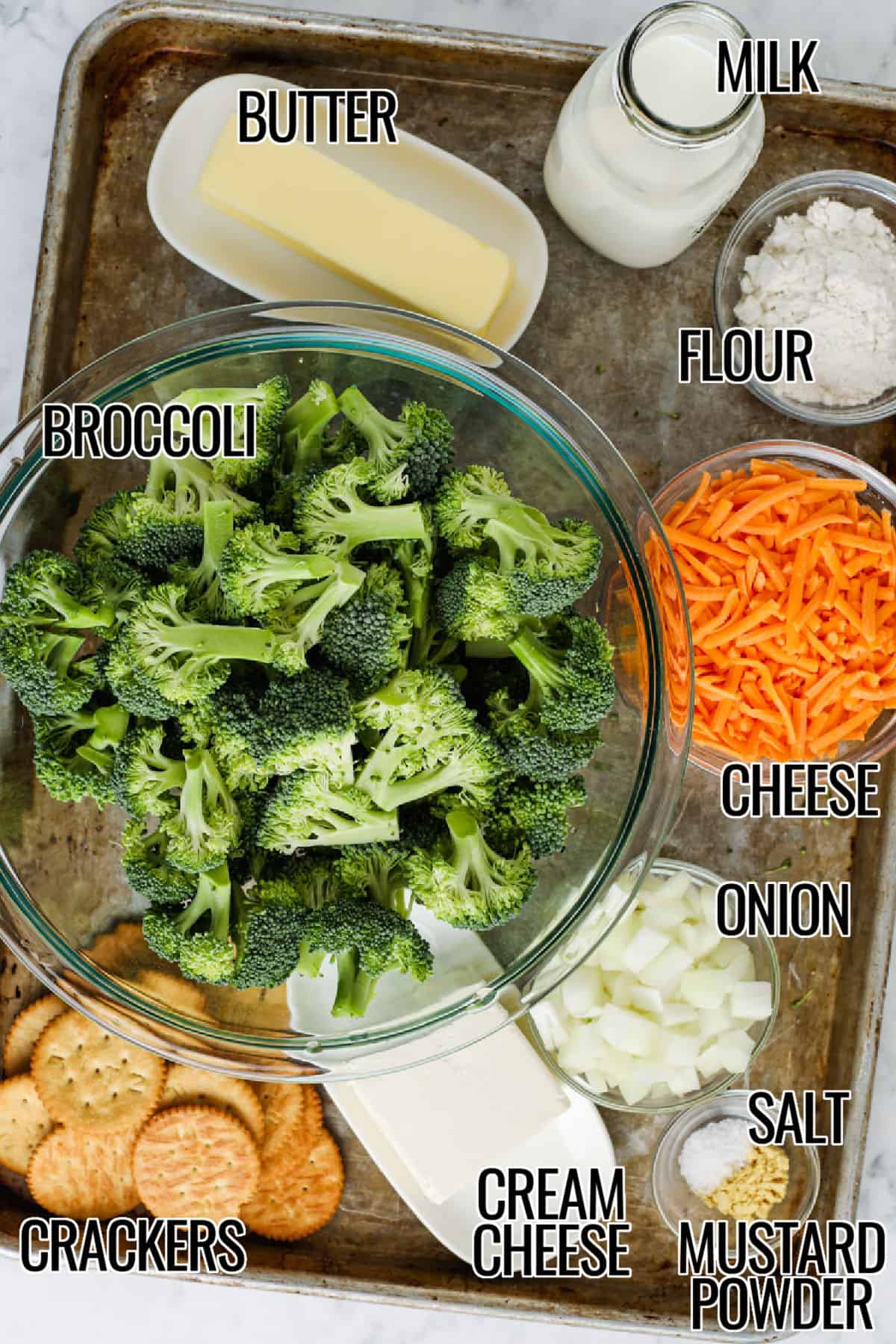 broccoli , butter , milk , flour , cheese , onion , salt , mustard powder , cream cheese and crackers to make Cheesy Broccoli Casserole with labels