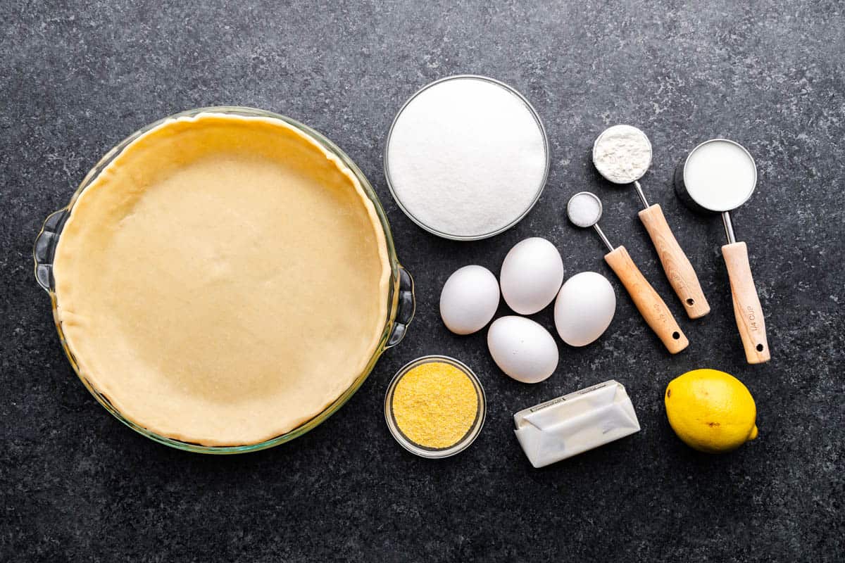 An overhead view of the ingredients needed to make Chess Pie.