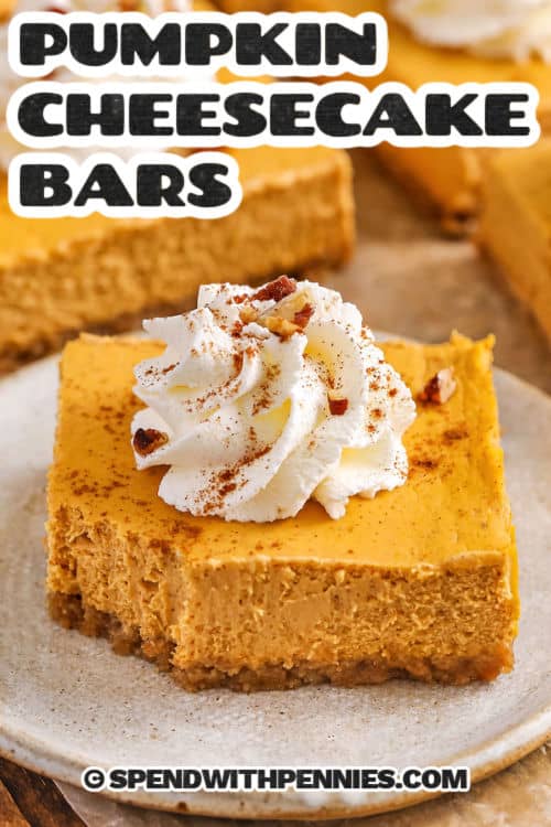 Pumpkin Cheesecake Bars with a slice on a plate with whipped cream and a title