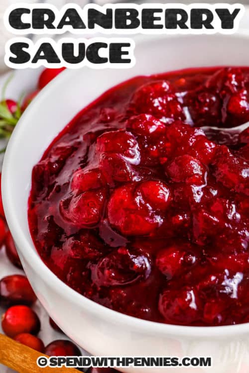 close up of a bowl of Quick Citrus Cranberry Sauce with a title