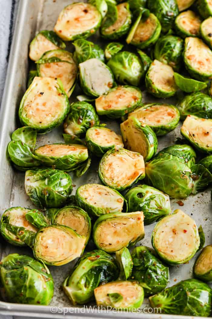 Roasted Balsamic Brussels Sprouts on a baking sheet before being roasted