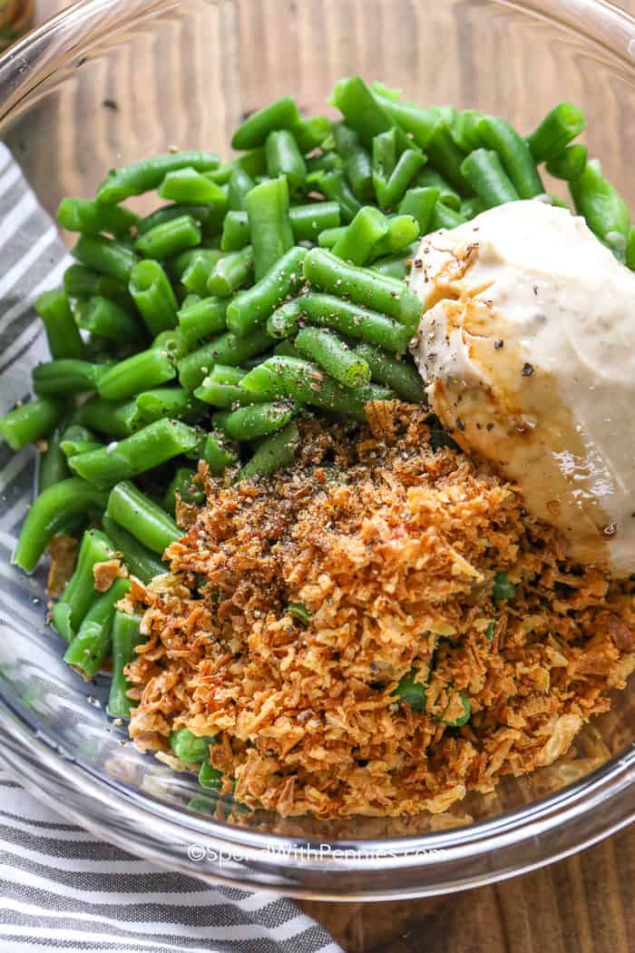 Green Bean Casserole ingredients in clear glass bowl