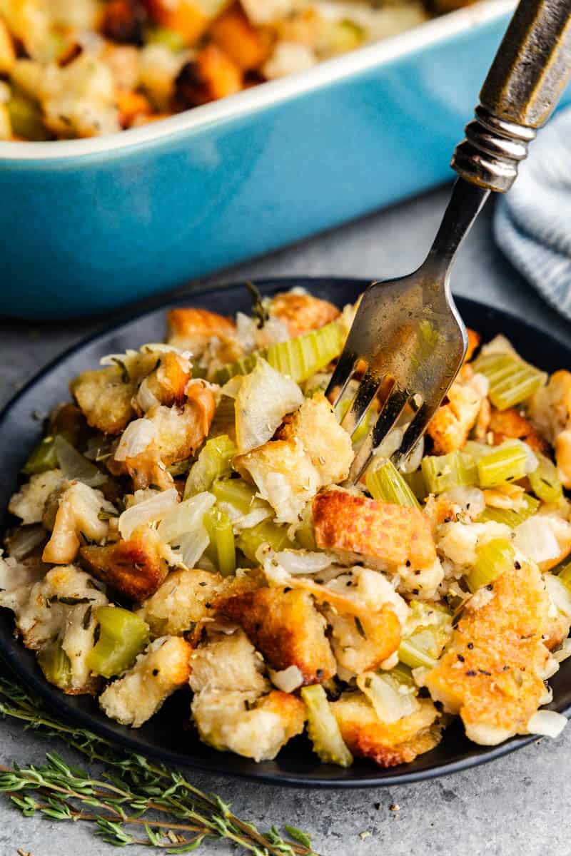 fork in a plate full of traditional stuffing