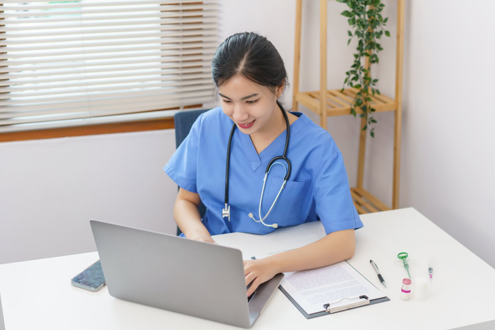 young vet using laptop