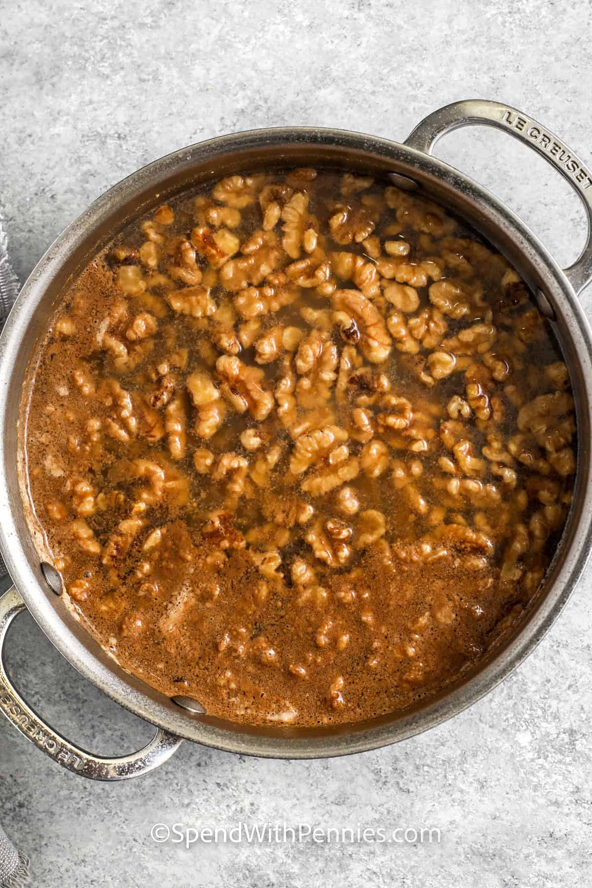 ingredients in pan to make Candied Walnuts