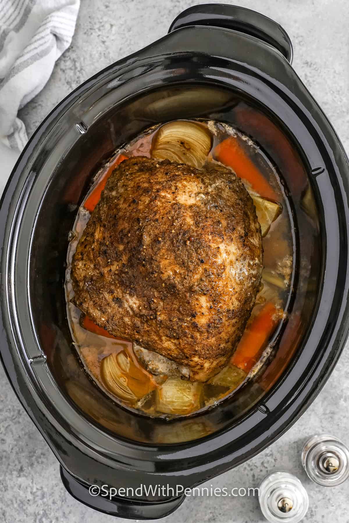 cooked turkey and veggies in a crockpot for Crockpot Turkey Breast