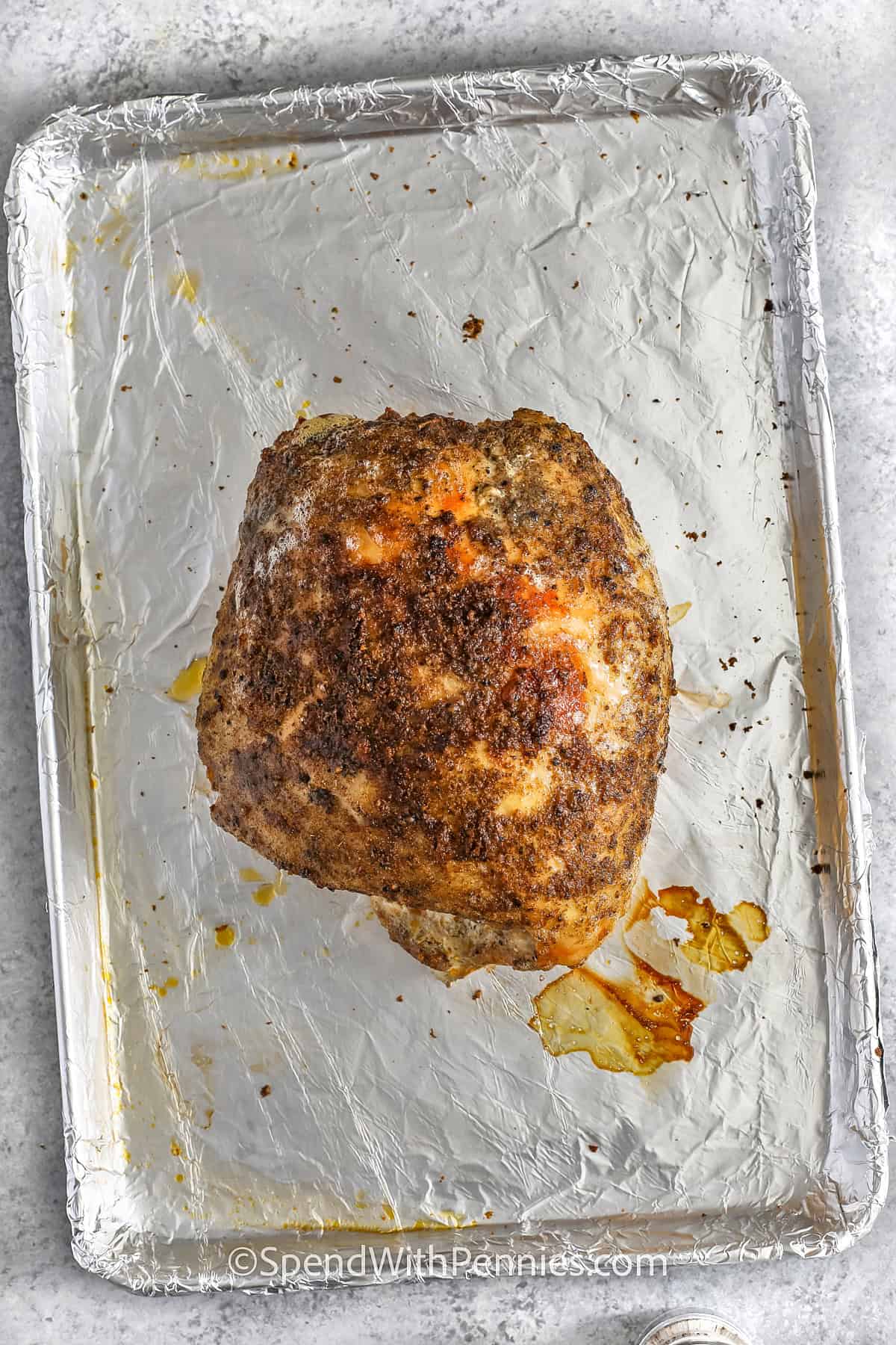 turkey breast on a sheet pan for Crockpot Turkey Breast