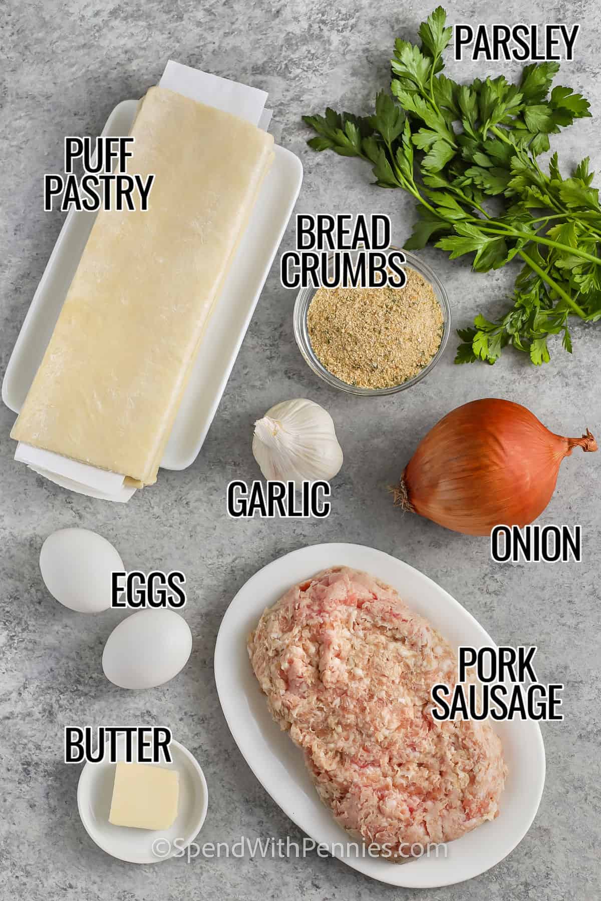 puff pastry , bread crumbs , parsley , garlic , onion , pork sausage , eggs , butter with labels to make Sausage Rolls