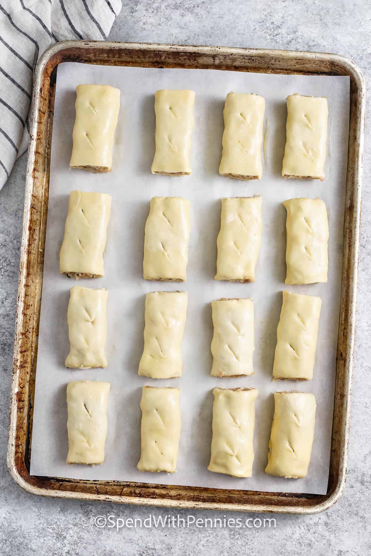 Sausage Rolls on a sheet pan before cooking