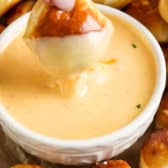 Pretzel bite dipped into a Beer Cheese Dip