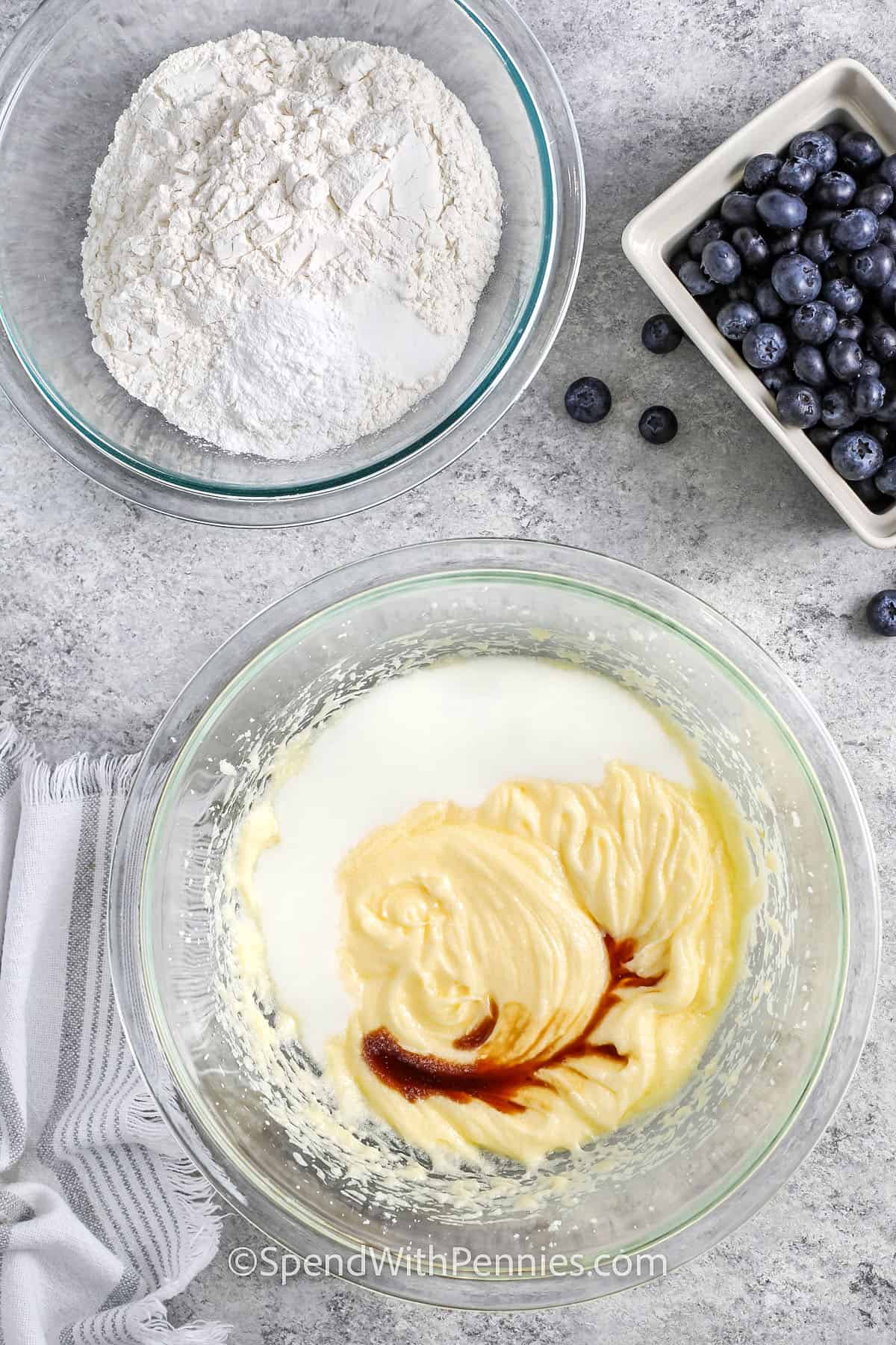 adding vanilla to wet ingredients to make Blueberry Muffins