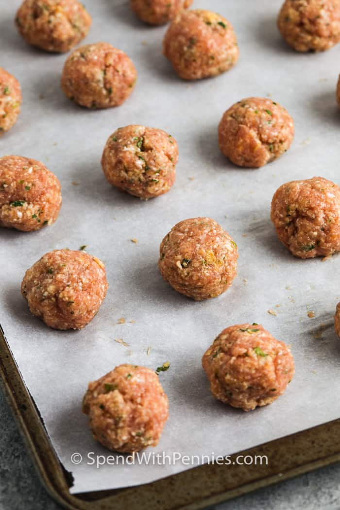 Chicken Meatballs on a baking sheet before cooking