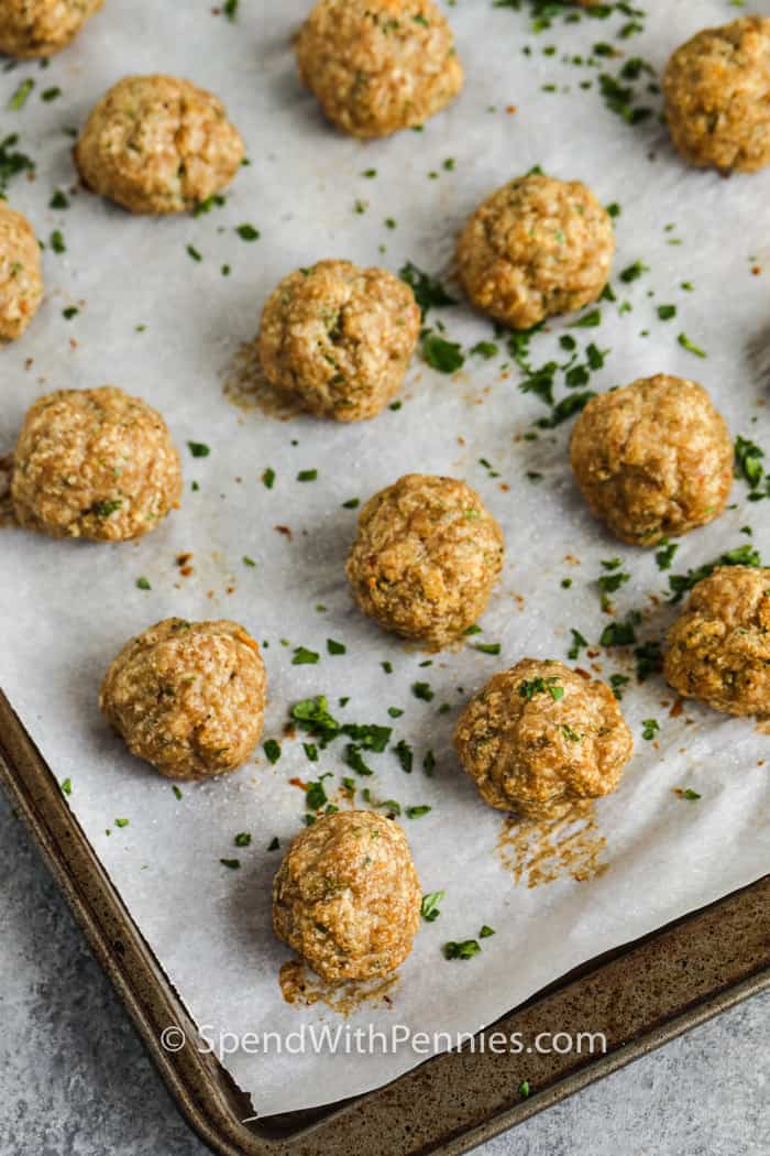 cooked Chicken Meatballs on a baking sheet