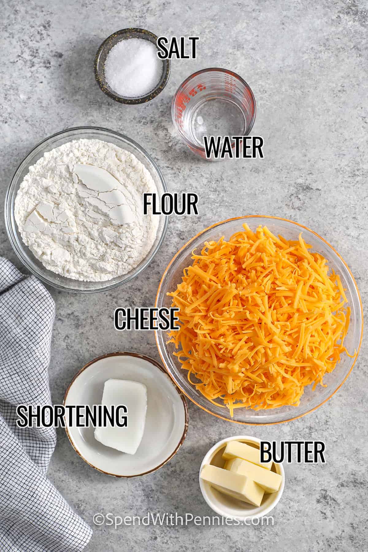 salt , water , flour , cheese , shortening , and butter with labels to make Homemade Cheez-Its