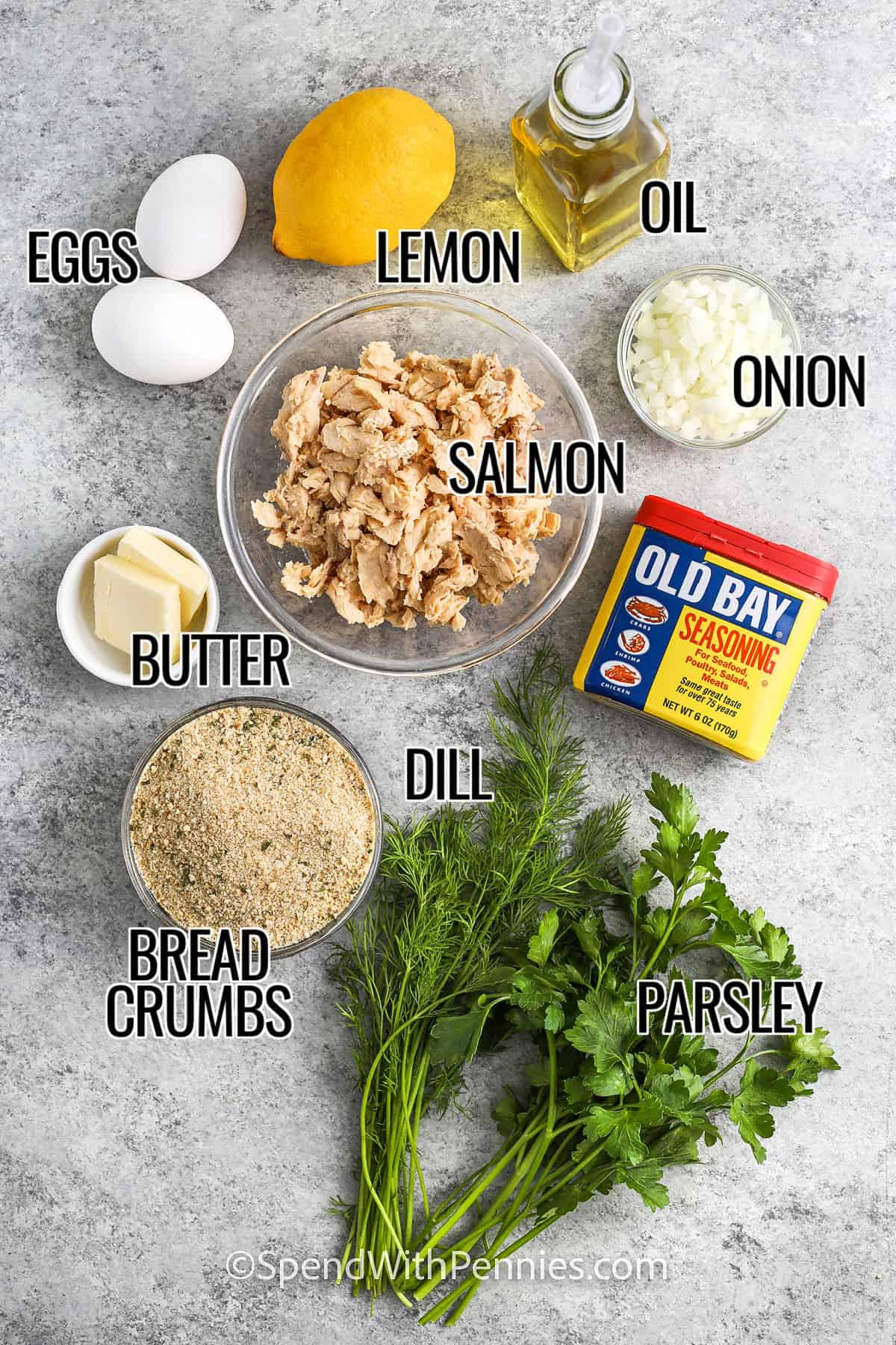 eggs , lemon , oil , onion , salmon , old bay seasoning , butter , dill , bread crumbs , and parsley with labels to make Salmon Patties