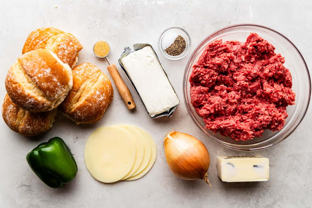 An overhead shot of ingredients for Ground Beef Cheesesteak.