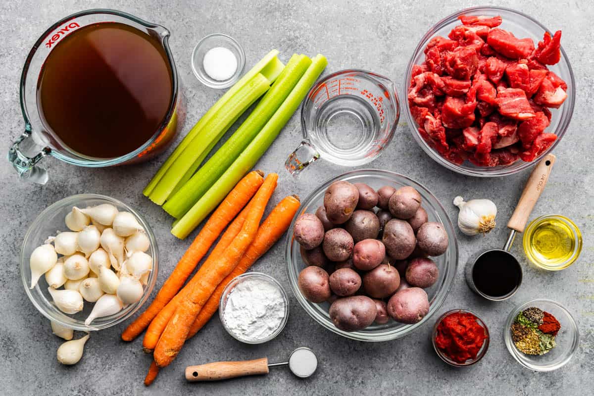 top view of raw ingredients needed to make homemade slow cooker beef stew