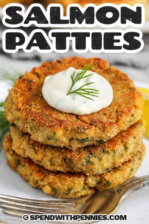 stack of Salmon Patties with sauce and a title