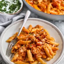 plated Penne alla Vodka with pan full in the back