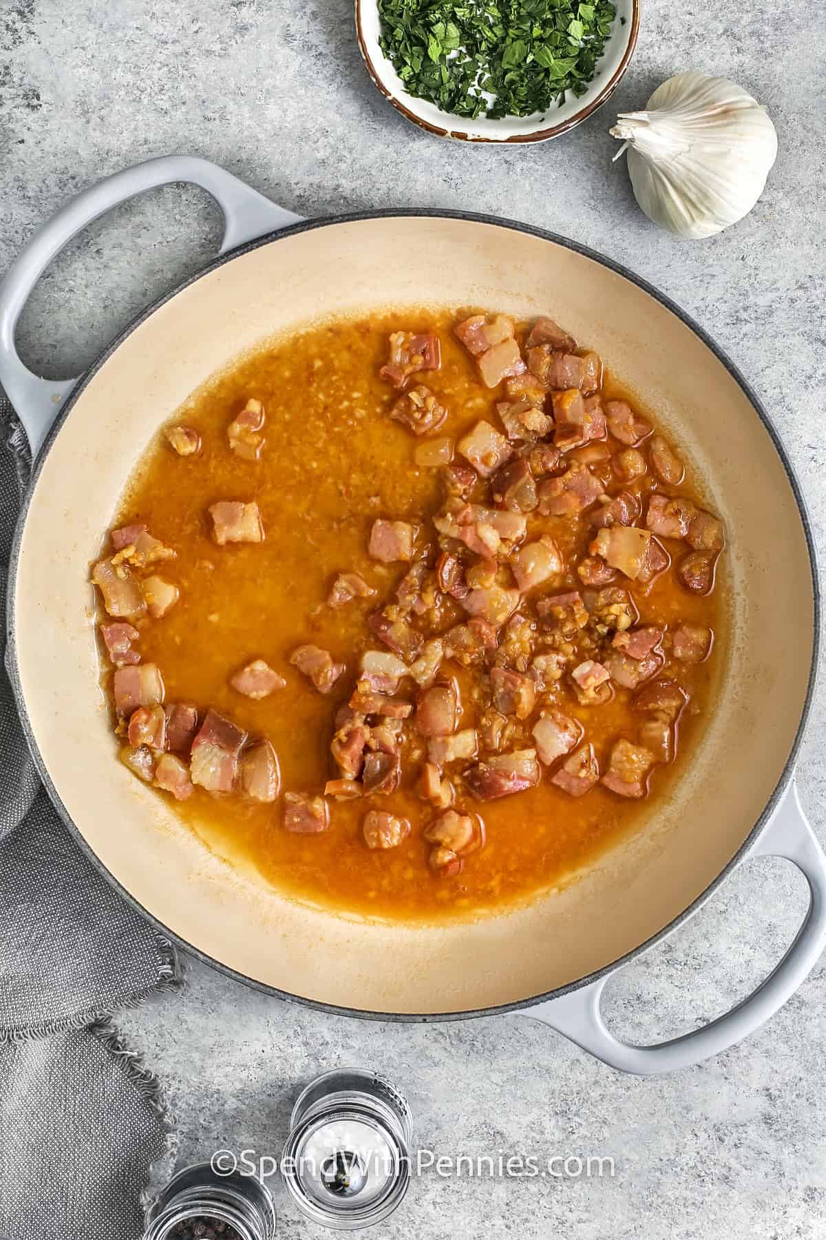 adding pancetta to pan to make Penne alla Vodka