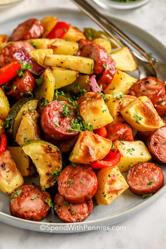 Roasted Sausage and Potatoes on a plate garnished with parsley