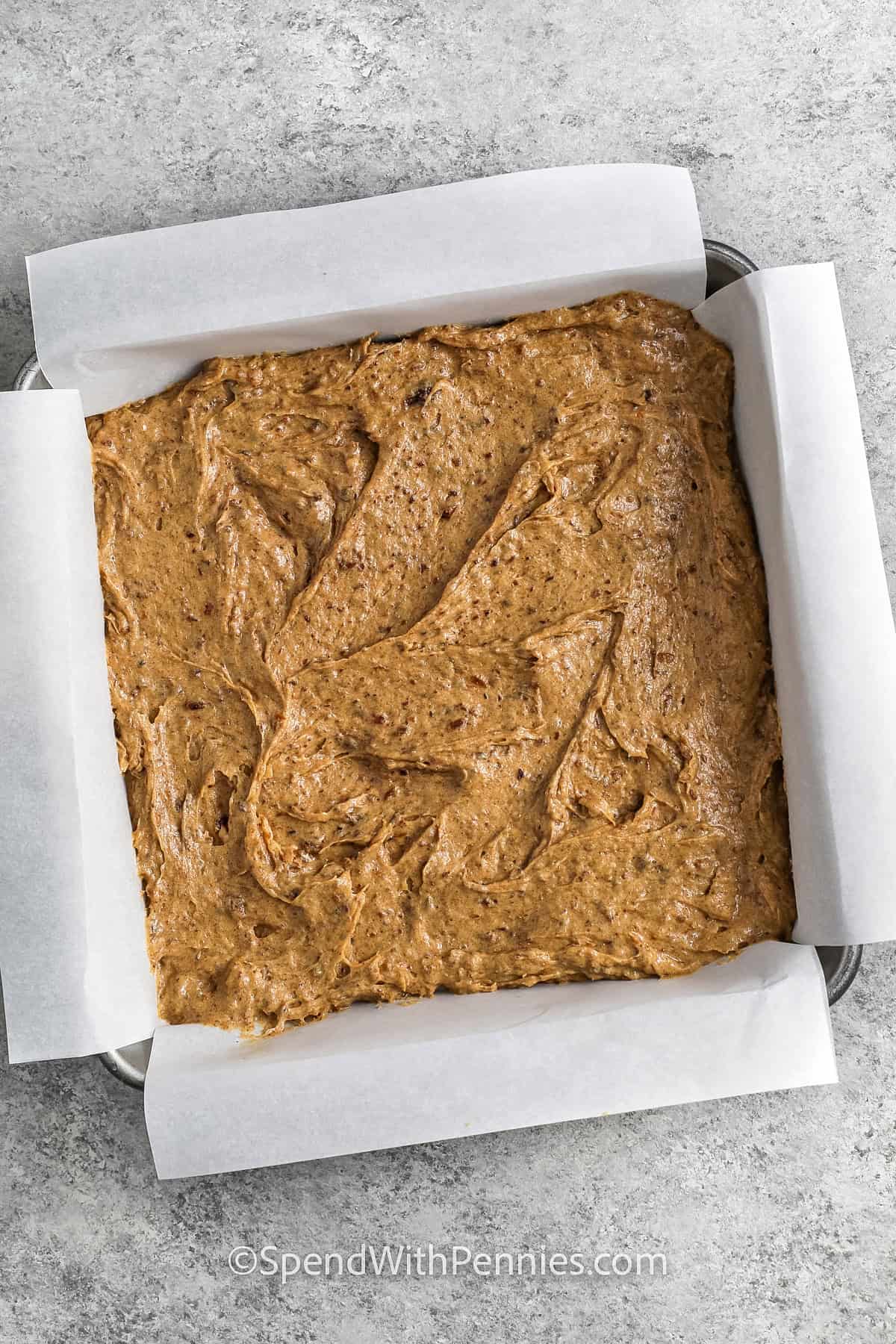 batter in a cake pan to make Sticky Toffee Pudding