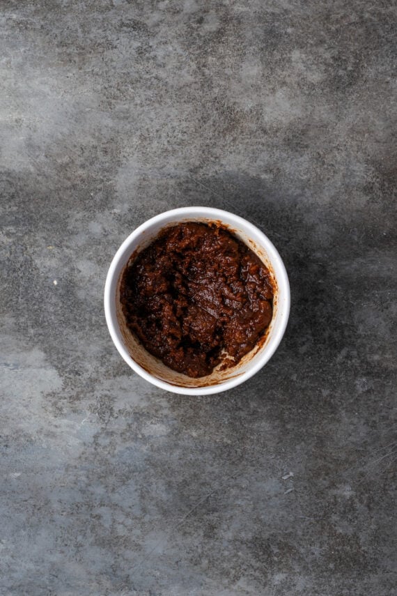 Cinnamon sugar filling in a small white bowl.