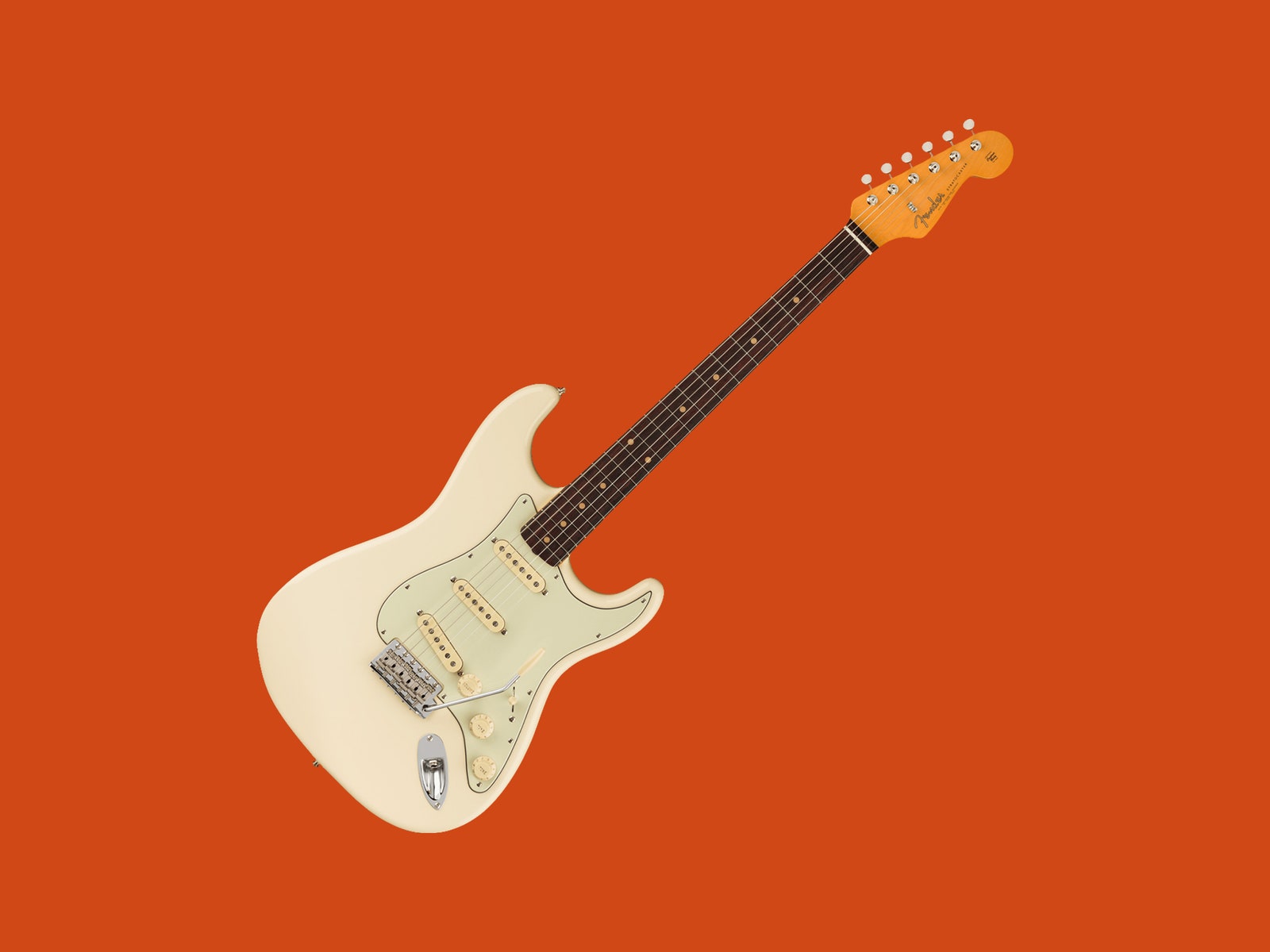 Fender American Vintage II Strat on an orange backdrop