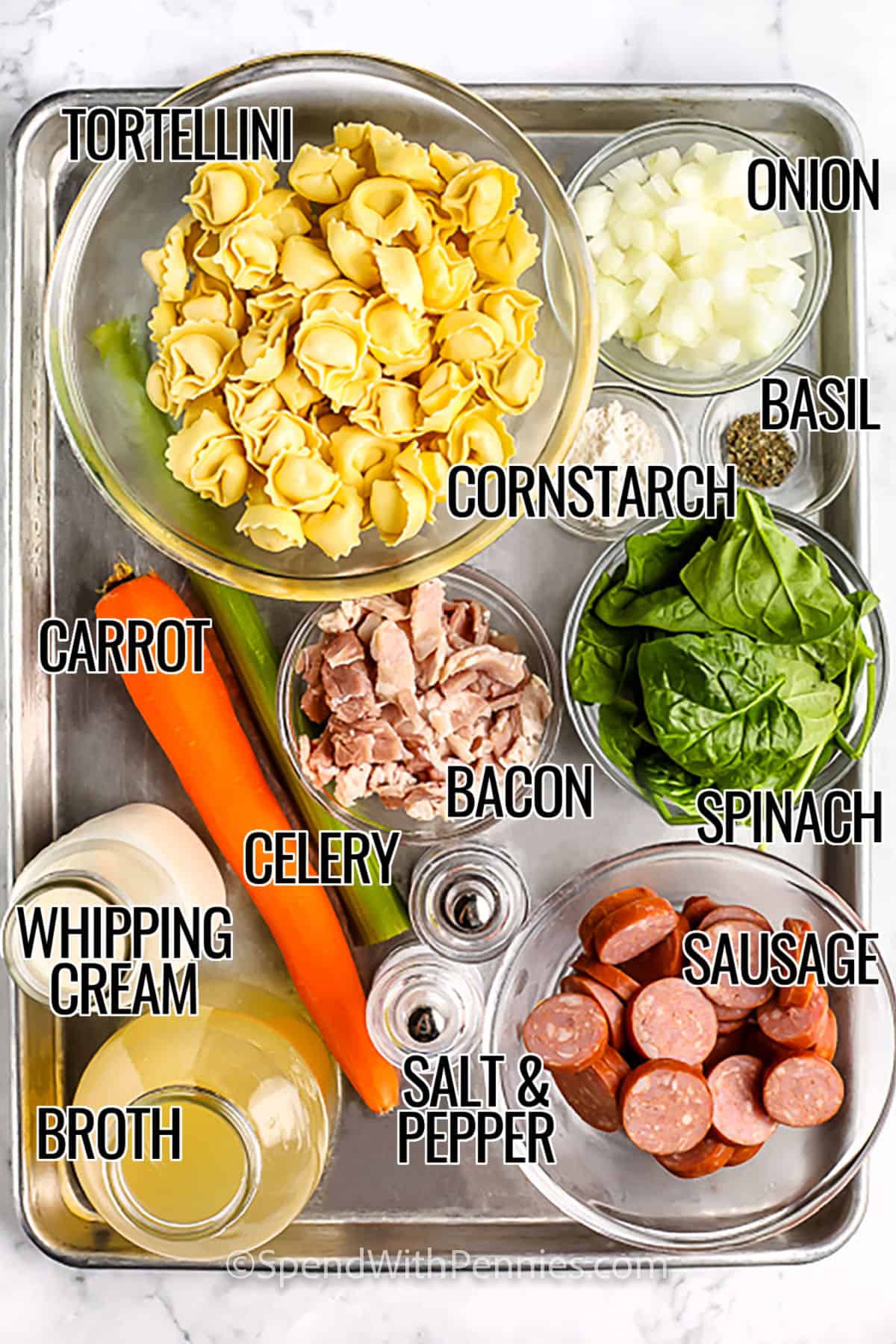 tortellini , onion , cornstarch , basil , spinach , bacon , celery , carrot , whipping cream , broth , sausage , salt and pepper with labels to make Creamy Tortellini Soup