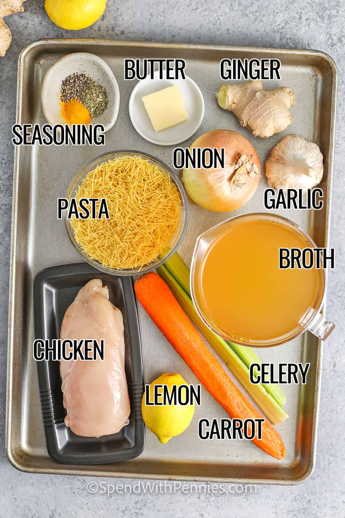 seasonings , butter , ginger , onion , garlic , pasta , broth , chicken , lemon , celery and carrots with labels to make Feel Better Chicken Soup