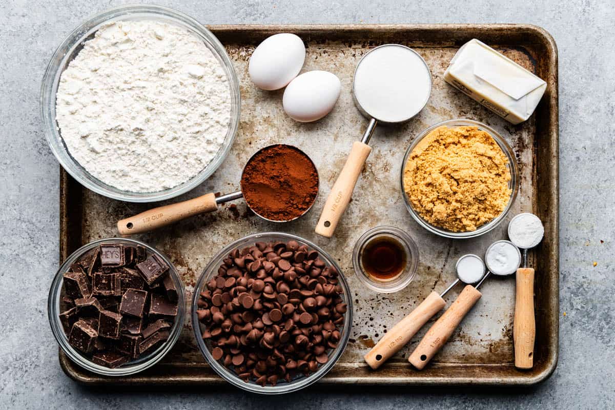 An overhead view of the ingredients needed to make Bakery Style Triple Chocolate Chip Cookies.