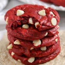 pile of Red Velvet Cake Mix Cookies with a bite taken out