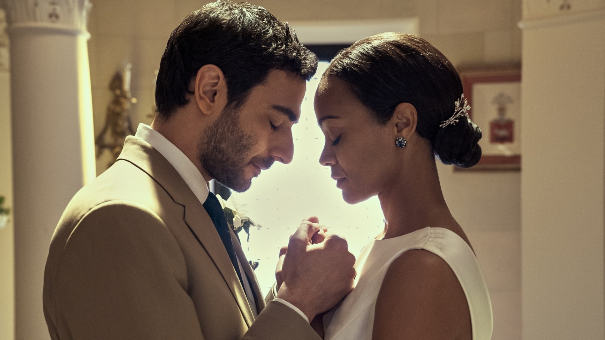 Eugenio Mastrandrea and Zoe Saldana in 